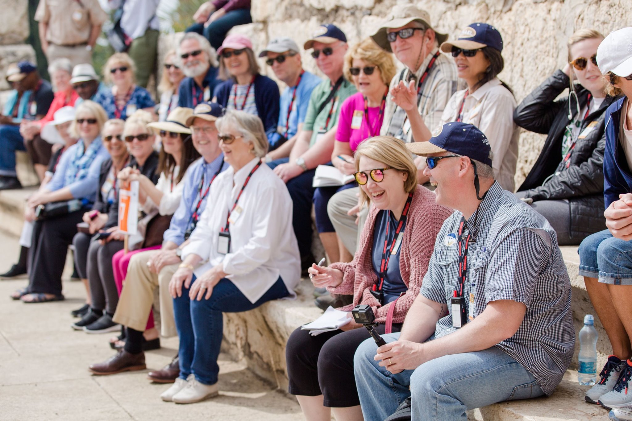 Group of people sitting down and laughing together in Israel