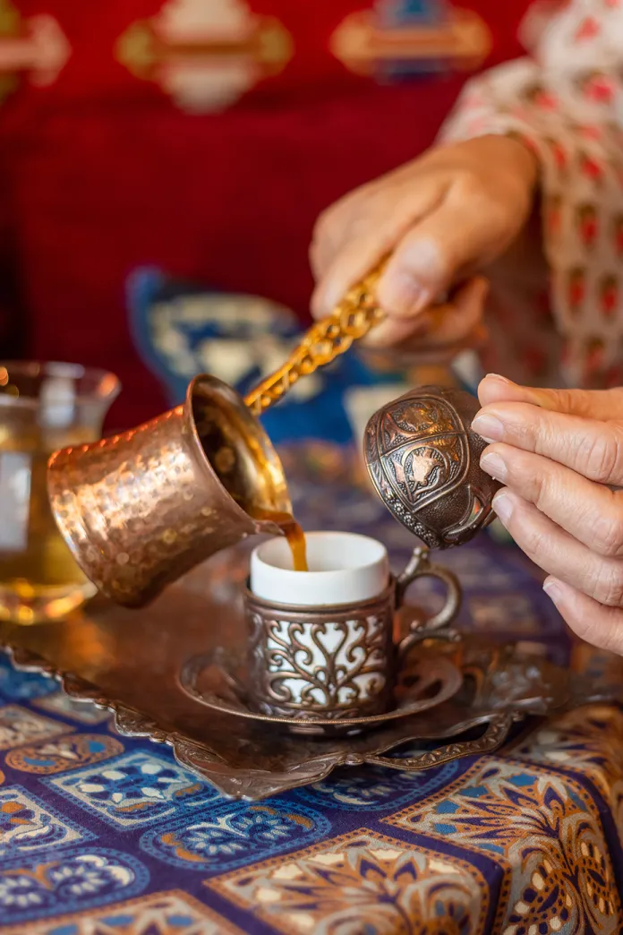 Turkish Coffee being poured into a cup