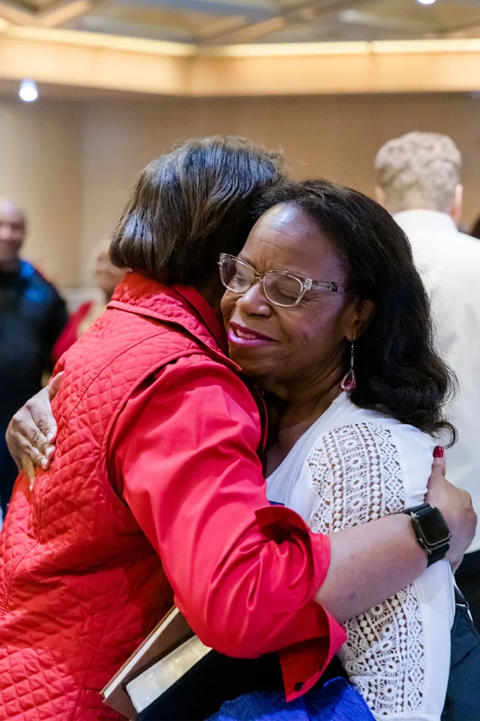 Two women hugging