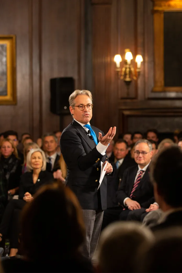 Eric Metaxas speaking to a room full of people