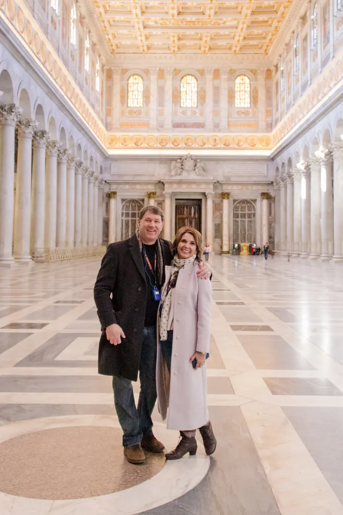 A couple standing together in the Basilica of Saint Paul