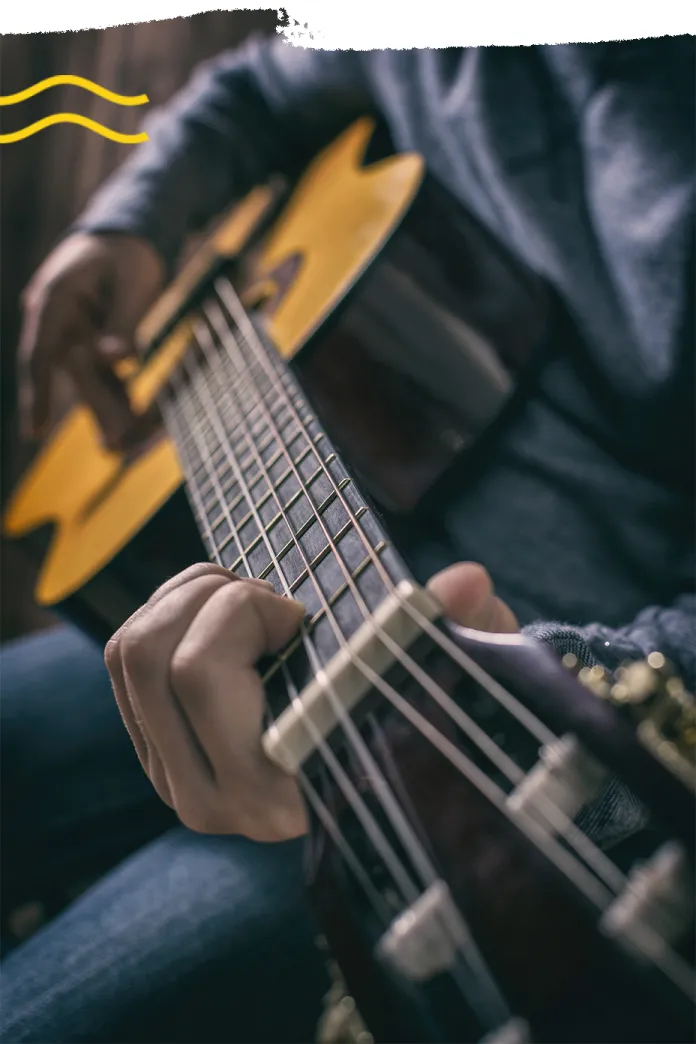 A person playing a guitar