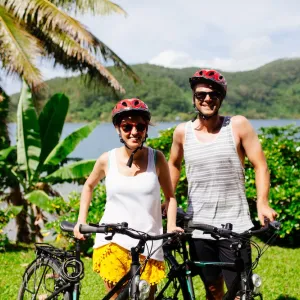 couple biking in hawaii